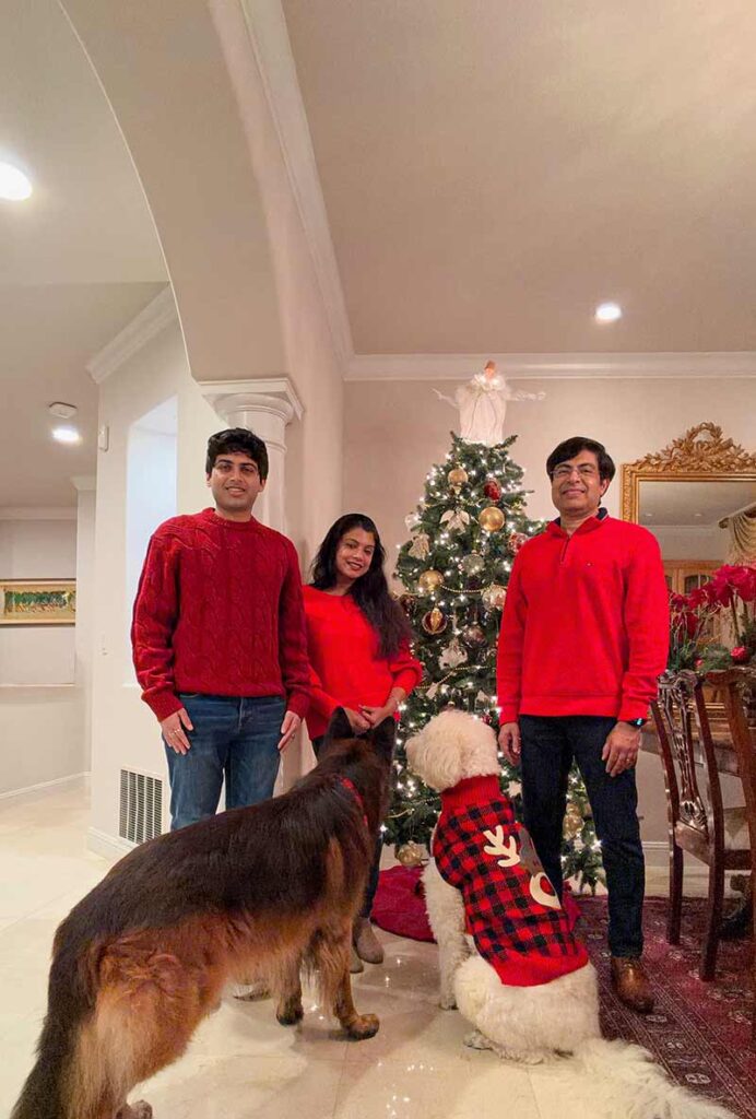 Dr. Sudeep with her family and 2 dogs – Biscuit (German Shepherd) and Cookie (Labradoodle).